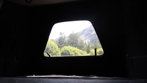 4-person Volkswagen with pop-up roof and long wheelbase for extra space