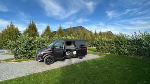 Biscy – 4 berth VW Campervan (Gas stove, 2 double beds, & gated car storage)