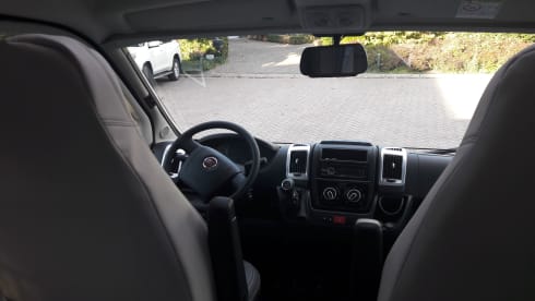 Cozy, modern, neat motorhome with queen bed