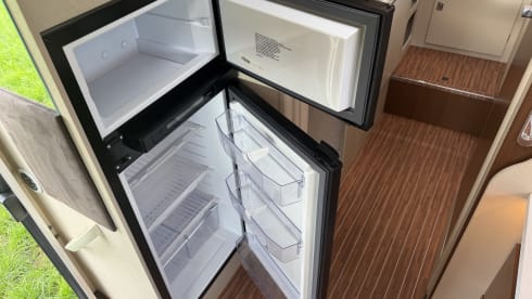 Camper met enkele bedden en alkoof!