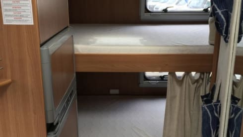 Cel4night – 7-seater overcab motorhome