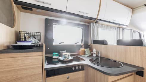 13/21 – Luxurious, complete camper with length beds and a pull-down bed!