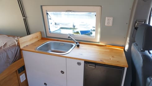 Pistachio – Mercedes Sprinter with large bed and extensive kitchen