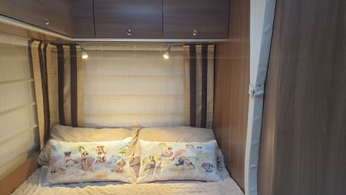 Gertie – Luxury 4 berth Burstner, fixed bed, heating, satellite TV