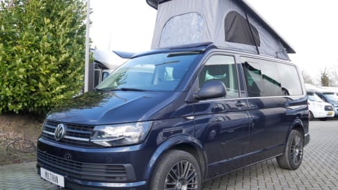 nice VW T6 Multivan with wide bed, pop-up roof, automatic