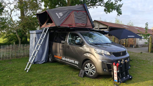 The AdventuresVan β Off-grid custom-made campervan with roof tent