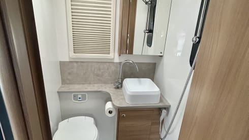Hugo  – Luxury 4 berth Bailey Adamo with drop down beds and large living spaces. 