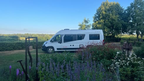  Off-grid bus camper from 2025 with length beds.