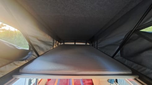 Compact extended Volkswagen with lifting roof