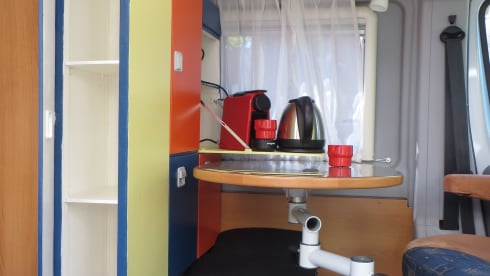 Compact bus camper with many useful extras