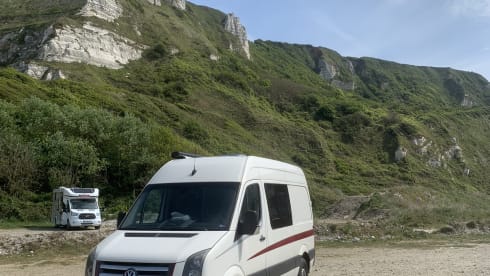 Home is where we park it! – Cool, fresh, self-sufficient 4 person bus camper.