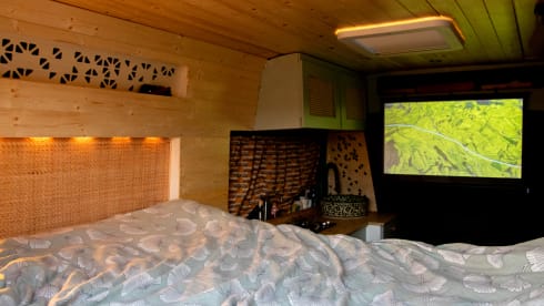 Adventurous camper van with on-board cinema and "Stealth Mode"