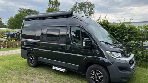 Super cool Hymer Ayers Rock bus camper for 2 people