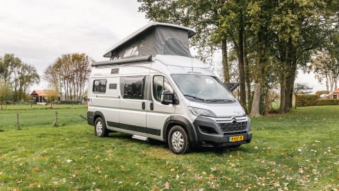 Fijnja – Luxury 4 pers. Pössl bus camper with sleeping lifting roof from 2019