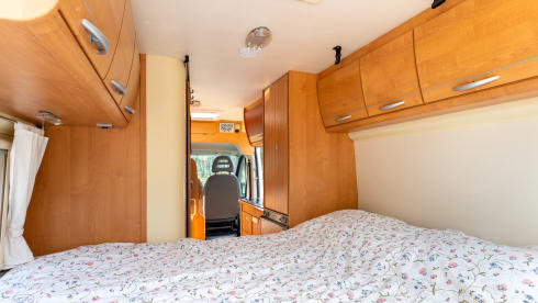 2 person bus camper with fixed bed and sanitary facilities