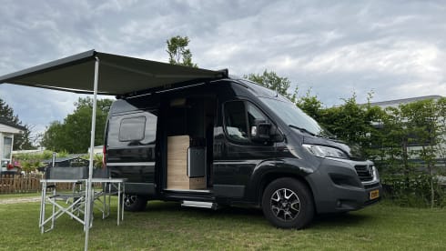 Super cool Hymer Ayers Rock bus camper for 2 people