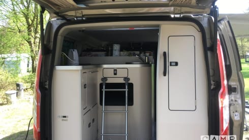 Luxury and complete bus camper - Ford Nugget Westfalia with lifting roof