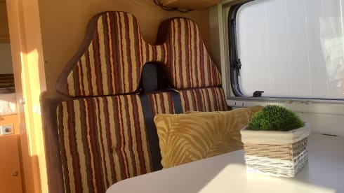 Semi-integrated camper