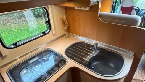 Zilveren parel. – Burstner with 2 x length bed and large dinette.