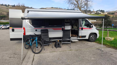 Off-grid campervan with lift-up bed, large garage 2024