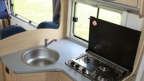 Spacious furnished family camper with bunk beds and air conditioning
