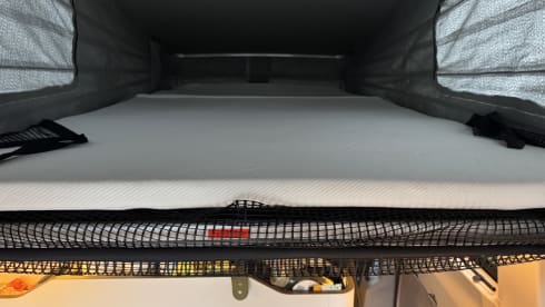 Nuggie – Fourgon aménagé Ford Nugget '25 bien conçu avec 4 couchages confortables