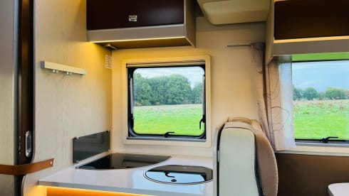 Koosje – Luxury Camper (5 persons) Lengthwise and lifting bed L-seat