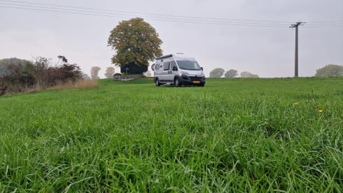 Fijnja – Luxury 4 pers. Pössl bus camper with sleeping lifting roof from 2019