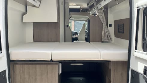 Experience the freedom of a compact bus camper
