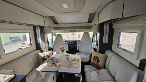 Luxury 4-person motorhome with bicycle rack and tow bar, model 2026