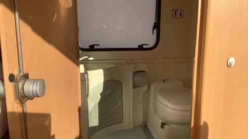 Semi-integrated camper