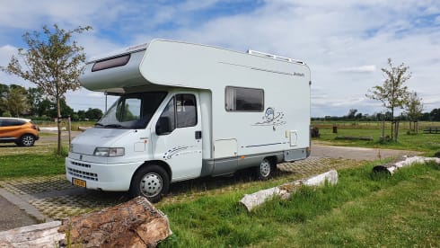 Nice 5 person Dethleffs alcove camper.
