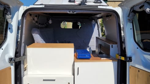 Cosy, compact off-grid Ford camper van