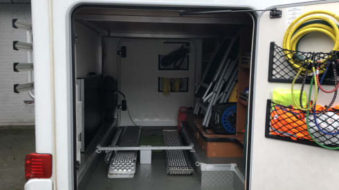 Wonderful luxury 4-person integral camper with plenty of storage space & bicycle carrier.