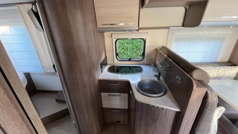 Bürstner/Fiat Ducato semi-integrated from 2016 with full leather upholstery.