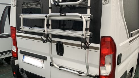 Experience the freedom of a compact bus camper