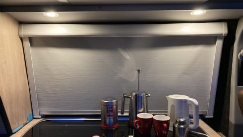 Guus (dan denk je aan brabant) – Red and white Volkswagen T5
