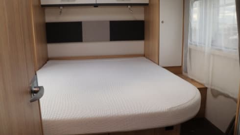 T69L – Complete HomeCar family camper with motor air conditioning and awning,