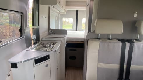 Beautiful 2-person Ford camper van from 2023 with luxurious furnishings