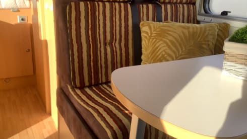 Semi-integrated camper