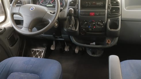 Spacious Fiat 2006 with fully comprehensive insurance, air conditioning, and a very cozy interior