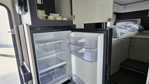 Luxury 4-person motorhome with bicycle rack and tow bar, model 2026