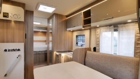 Enjoy comfort and freedom with this new semi-integrated camper
