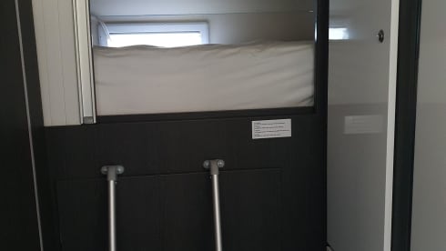 Luxury mobile home with spacious beds and a very large garage