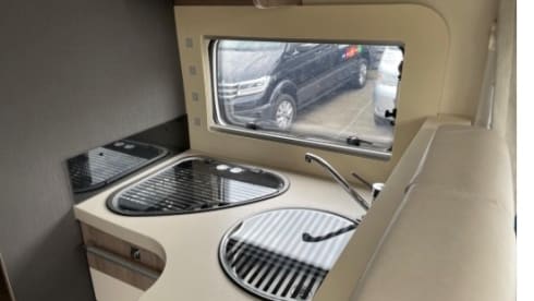 Spacious, well-equipped Chausson Titanium 728 EB motorhome for rent