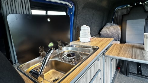 Una – 3 berth Volkswagen Caddy campervan from 2015