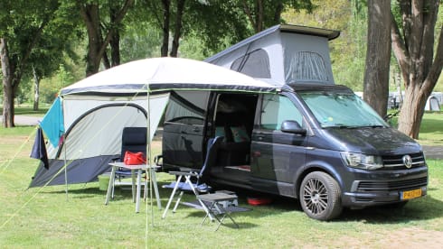 nice VW T6 Multivan with wide bed, pop-up roof, automatic