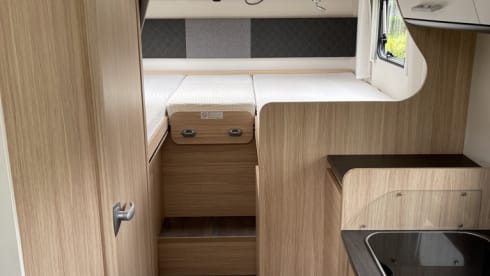 13/21 – Luxurious, complete camper with length beds and a pull-down bed!