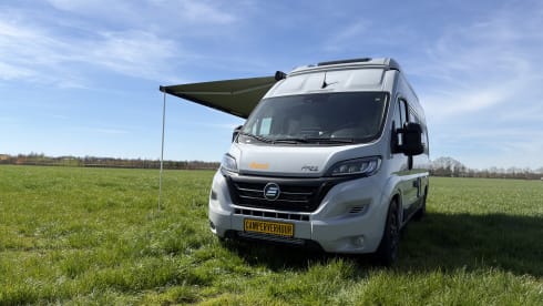 Making Memories 10 – 2024 Hymer Free 602 Automatic with a pop-top roof and a 4-person bike carrier