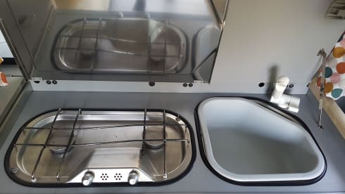 Cheerful Volkswagen camper van with lifting deck and pull-out bed for 2 people